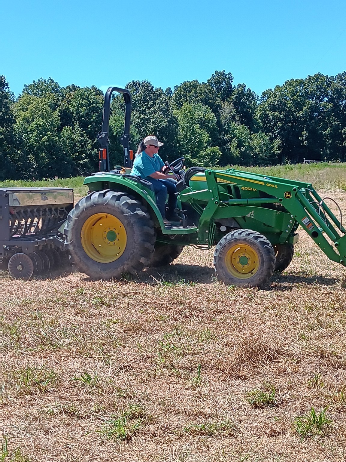 John Deere tractor in a food plot